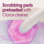 Close-up of a pink toilet wand pad foaming in a toilet bowl with text about preloaded cleaner