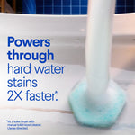 ToiletWand scrubbing pad in use inside a toilet bowl with text about powering through hard water stains