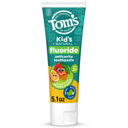 Tube of Tom’s of Maine Kid’s Natural fluoride anticavity toothpaste in outrageous orange mango flavor on white background.