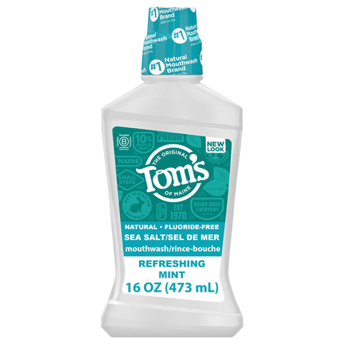 Bottle of Tom's of Maine Sea Salt fluoride-free mouthwash with teal label reading refreshing mint, 16 oz