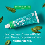 Tom's of Maine Wicked Fresh toothpaste tube on teal background with mint leaves and text promoting natural ingredients and spearmint ice flavor.