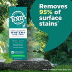 Tom's Whiten+ Deep Clean spearmint toothpaste box shown outdoors with large callout bubble stating 'Removes 95% of surface stains'