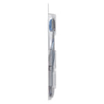 Side profile of a single manual toothbrush in clear plastic clamshell packaging on white background