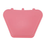Top-down view of a pink trapezoidal retainer case lid showing three latch tabs along the edge