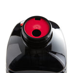 Top view of black fuel bottle neck showing a red pour insert and circular dispensing opening
