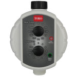 Toro low-pressure tap timer front view showing run-time and frequency dials, status LEDs