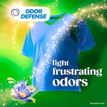 Blue T-shirt with sparkling cleansing effect and 'odor defense' badge beside copy reading 'fight frustrating odors' on green backdrop