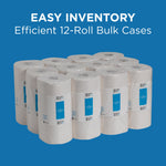 Twelve individually wrapped Pacific Blue Select paper towel rolls arranged as a bulk case on a blue background.