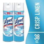 Two Lysol Crisp Linen disinfectant spray cans side by side with a teal panel reading CRISP LINEN and 38 oz.