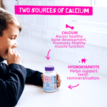 Child looking at a Jack N' Jill Tooth Sparkles bottle on a table with copy highlighting two sources of calcium