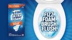 Composite image showing a Ty-D-Bol Ultra Foam product box beside a toilet bowl with blue foam and large text 'FIZZ. FOAM. BRUSH. FLUSH.'