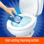Hand pouring a blue Ty-D-Bol Ultra Foam single-use packet into a toilet bowl filled with foamy blue cleaning solution.