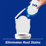 Hand dropping a wrapped Ty-D-Bol tablet into an open toilet tank with text stating 'Eliminates Rust Stains' on blue background