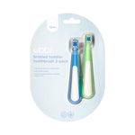 Packaged Ubbi bristled toddler toothbrush 2-pack in blue blister card, showing both toothbrushes inside.