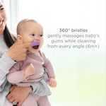 Adult using a purple silicone finger toothbrush on a baby’s gums with on-image text about 360° bristles and gentle massaging.