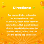 Directions panel on an orange background instructing to see garment label, pretreat tips, and use the dosing cap for best results
