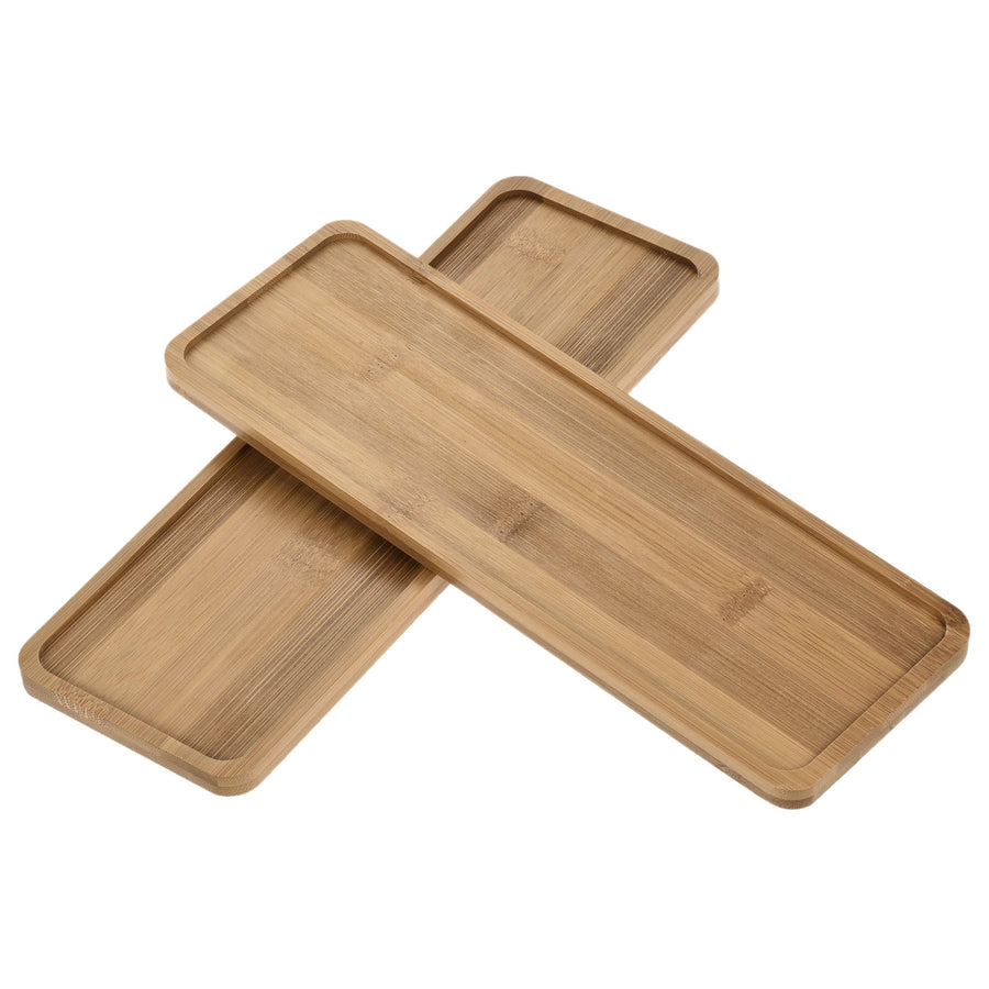Two rectangular bamboo plant drip trays with shallow raised edges, shown overlapping on white background.