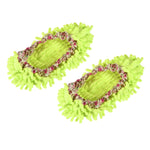 Pair of bright green chenille microfiber shoe covers with floral elastic trim on a white background.