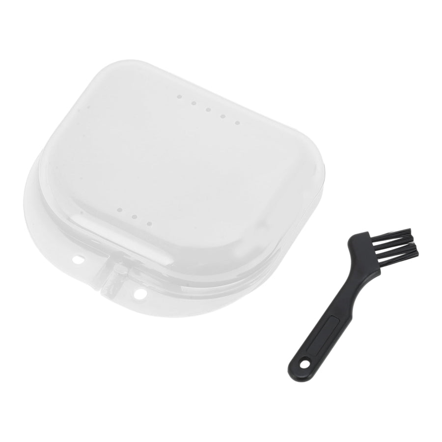 Clear plastic orthodontic retainer/travel case with ventilation holes and a small black cleaning brush on white background