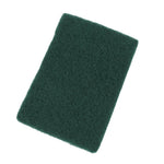 Tilted dark green rectangular scouring pad shown against a white background