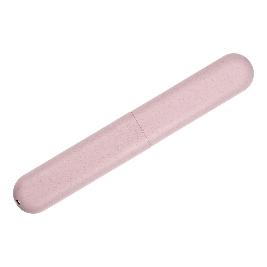 Single pink cylindrical travel toothbrush case on white background, speckled texture visible