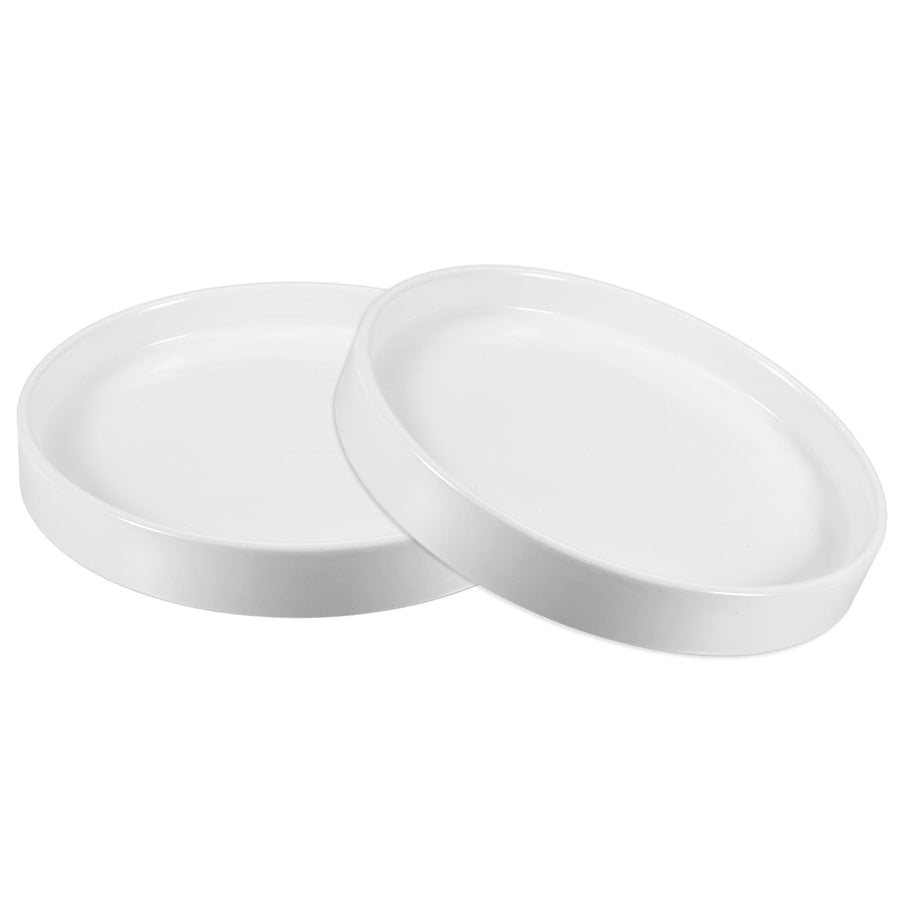 Two white ceramic round plant saucers shown overlapping on a white background