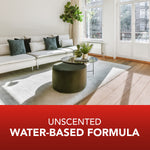 Bright living room scene above red panel reading 'Unscented water-based formula' showing sofa, rug and coffee table