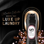 Tall black Unstopables N.15 bottle with pink scent beads and text "Luxe Up Laundry" on a dark textured background