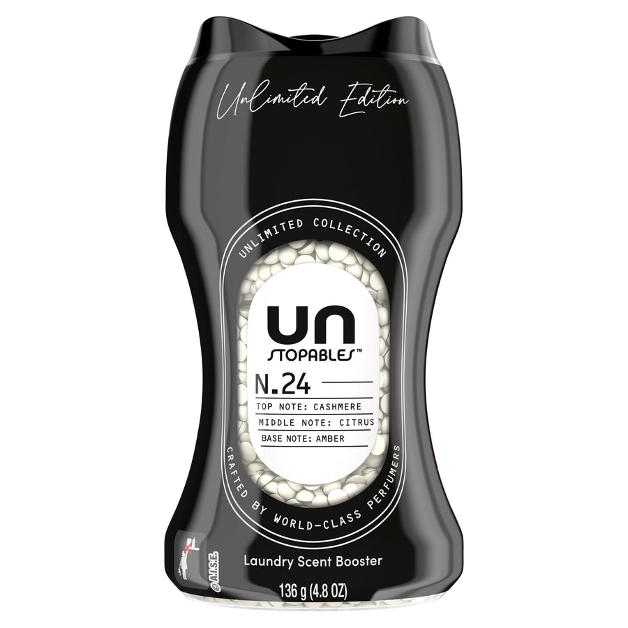 Close-up product shot of a black Unstopables N.24 laundry scent booster bottle showing label and visible white beads.