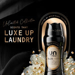 UNSTOPABLES N.26 bottle against black fabric with gold oval frame, floral accents and text ‘luxe up laundry’