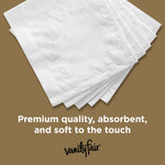 Fanned white embossed napkins displayed on a brown background with text highlighting soft, absorbent quality