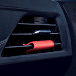 Red Little Trees Vent Wrap clipped onto a vehicle air vent showing how the product attaches