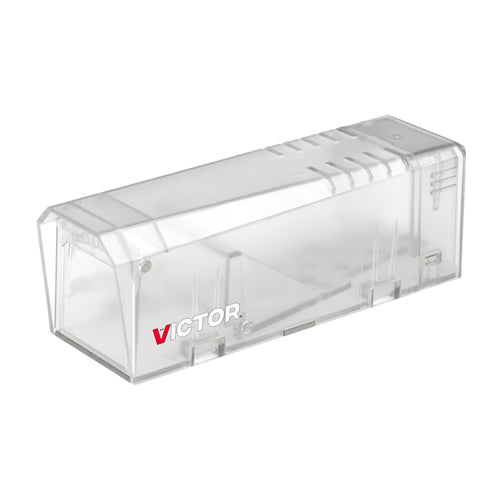 Transparent plastic Victor live-catch mouse trap photographed on white background with brand logo visible