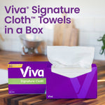 Two purple Viva Signature Cloth in a Box packages on a kitchen counter, one open showing a pulled white sheet