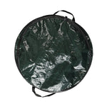 Top-down view of a round dark green pop-up collapsible garbage can showing carry strap and rim