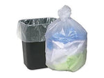 Black rectangular wastebasket with a clear liner beside a tied translucent trash bag containing colored items