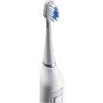 White electric toothbrush handle with a Triple Sonic replacement head attached, showing bristles and silver accent.