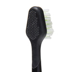 Rear and side view of a black Waterpik Triple Sonic replacement toothbrush head showing textured rubber back and bristles.