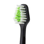 Close-up of a black Waterpik Triple Sonic replacement toothbrush head showing clustered green and white bristles.