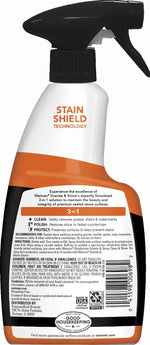 Close-up of the upper half of a Weiman spray bottle showing black trigger, neck and “Stain Shield Technology” on the label