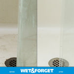 Close-up split before-and-after of a shower drain and floor with Wet & Forget branding strip below