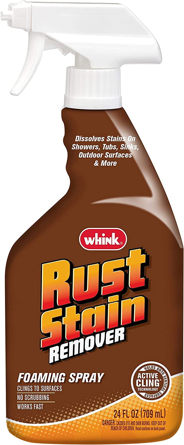 Close-up product photo of a Whink Rust Stain Remover foaming spray bottle with brown label and white trigger top.