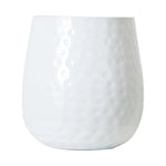 White hammered-texture oval iron planter with rounded base on white background