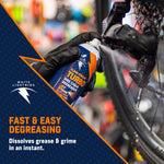 Gloved hand spraying White Lightning Turbo degreaser at a bicycle derailleur; diagonal branded graphic and text visible