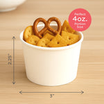 White paper snack cup filled with crackers and a pretzel, with dimension arrows and a pink badge reading "Perfect 4 oz. Portion Size"