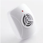Close-up studio shot of a white ultrasonic pest repeller showing speaker grille and red indicator LED