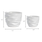 White wavy ceramic pots with measurement callouts showing heights and diameters on a white background.