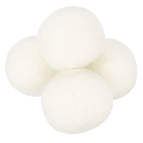 Cluster of four white wool dryer balls on a white background, showing felted texture.