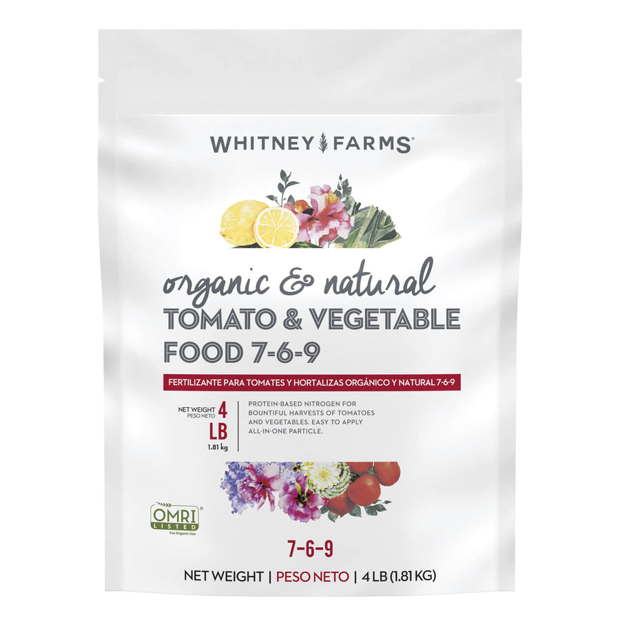 White Whitney Farms bag of organic tomato & vegetable food with floral and tomato artwork and 7-6-9 label