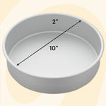 Photograph of a plain 10-inch round aluminum cake pan with overlaid arrows and text indicating 10-inch diameter and 2-inch depth.
